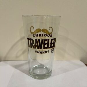 Curious Traveler Shandy Pint Glass